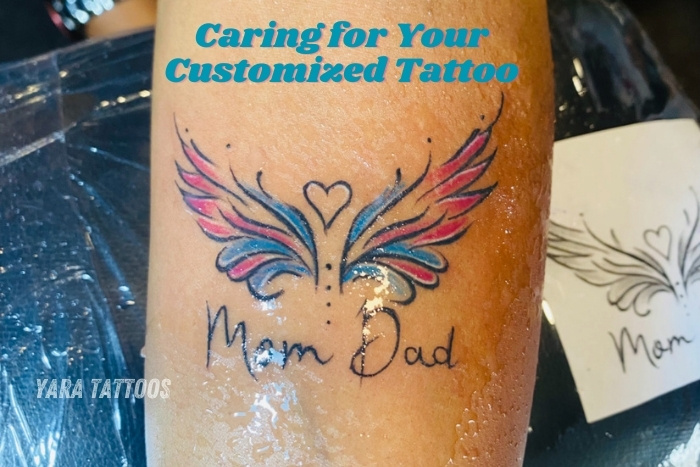 Customized Mom and Dad Meaningful Family Tattoo Art with Wing Design at Yara Tattoos in Coimbatore