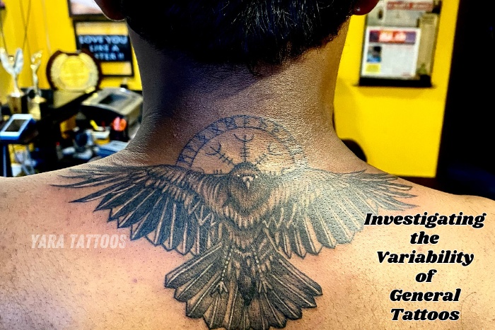 Bold and intricate back tattoo of a majestic flying bird with a clock element, done at Yara Tattoos in Coimbatore